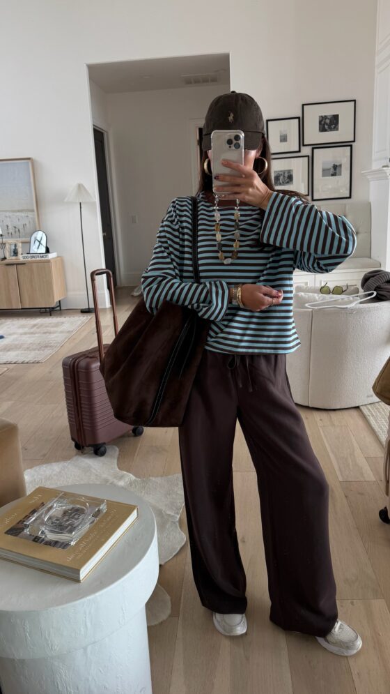 Christine Andrew in a fall outfit amazon shirt and aritzia pants